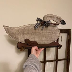 Primitive decor swan on wheels